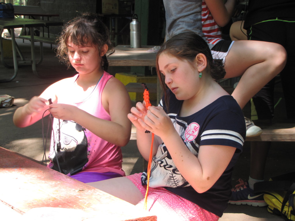 Maccabiah 5th -7th grade girls make bracelets to benefit the American Cancer Society.