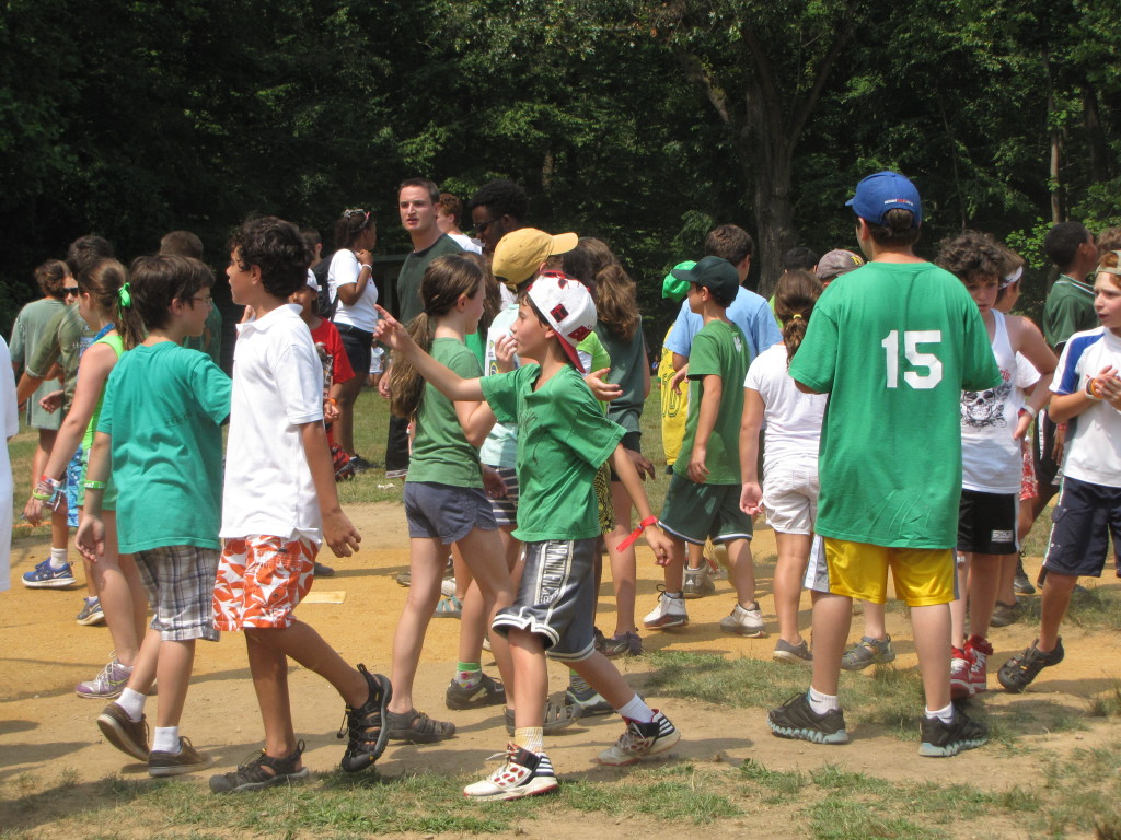Capture the flag boosts camp spirit.